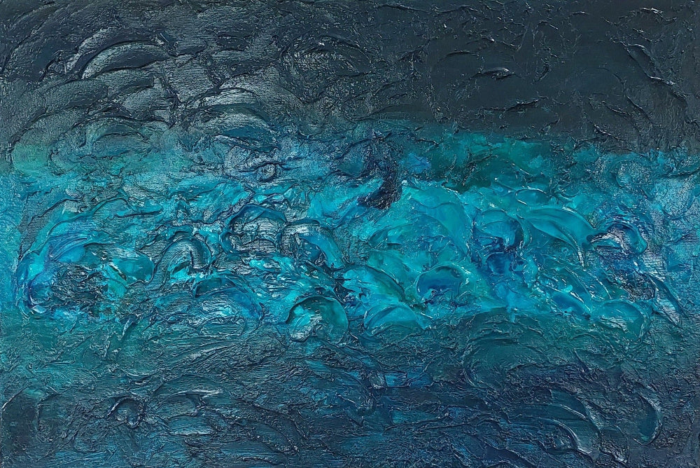Abstract painting with blue and black tones on a wooden surface