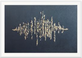 Framed artwork with a gold abstract design on a black background