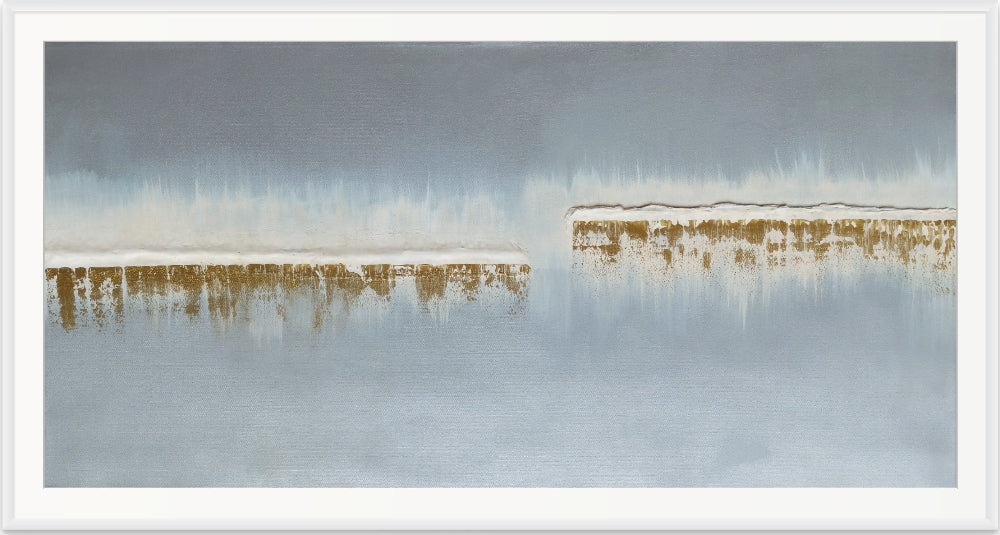 Reflective water surface with a blurred landscape in the background