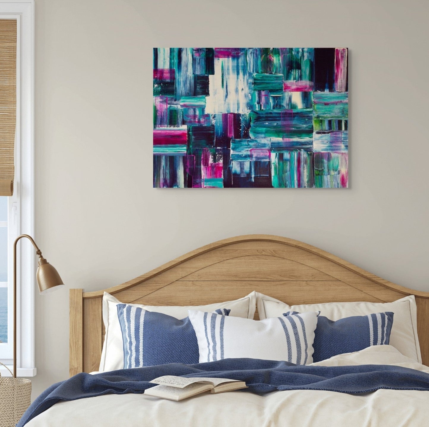 Bedroom with abstract art above the bed