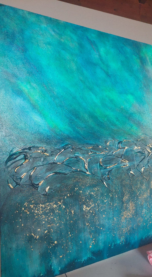 An abstract textured painting featuring a gradient of teal, turquoise, and blue with metallic gold glitter accents and raised, shimmering wave-like patterns across the lower half. Equinox, Original Canvas Painting by Julie Bevan