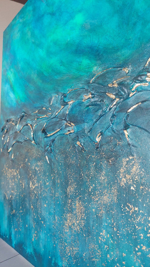 An abstract textured painting featuring vibrant turquoise, teal, and blue tones with metallic gold leaf accents and raised impasto brushstrokes. Equinox, Original Canvas Painting by Julie Bevan