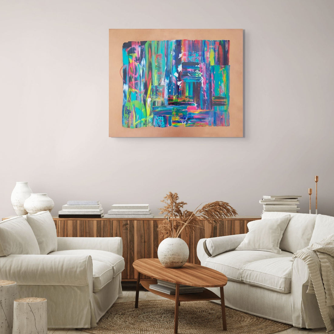 Living room with two white sofas, a wooden coffee table, and a colorful abstract painting on the wall. Tao an original abstract canvas painting by Julie Bevan