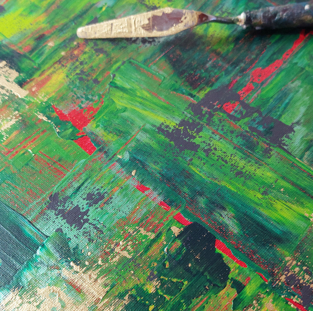 Abstract painting with a palette knife on a textured surface