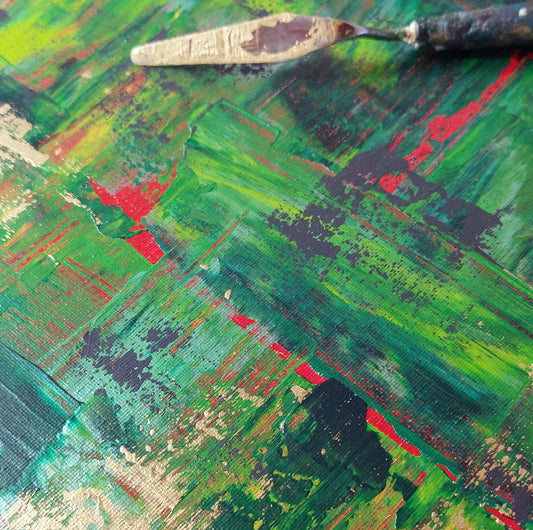 Abstract painting with a palette knife on a textured surface