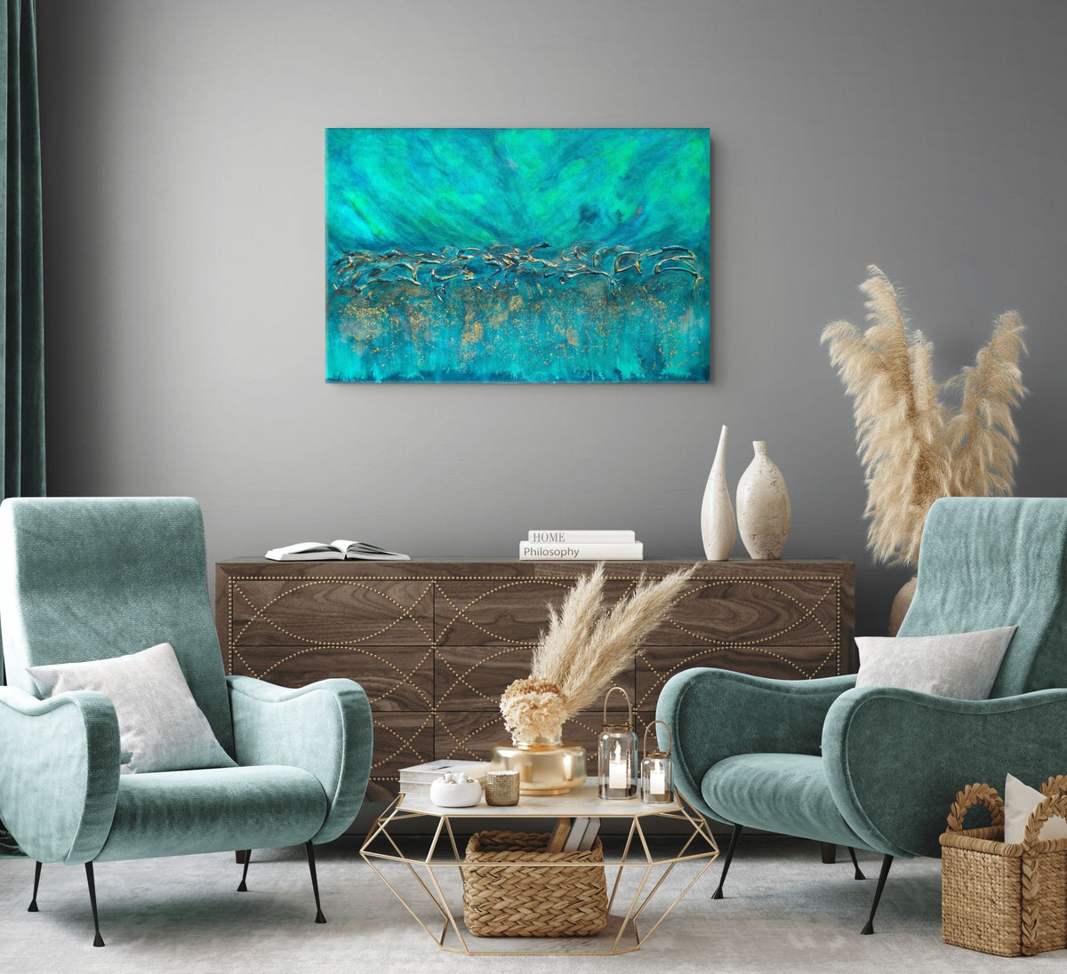 A modern living room setup featuring a square abstract canvas print with vibrant teal, turquoise, and gold brushstrokes, hung on a gray wall above a dark wood credenza and two teal armchairs. Equinox, Original Canvas Painting by Julie Bevan