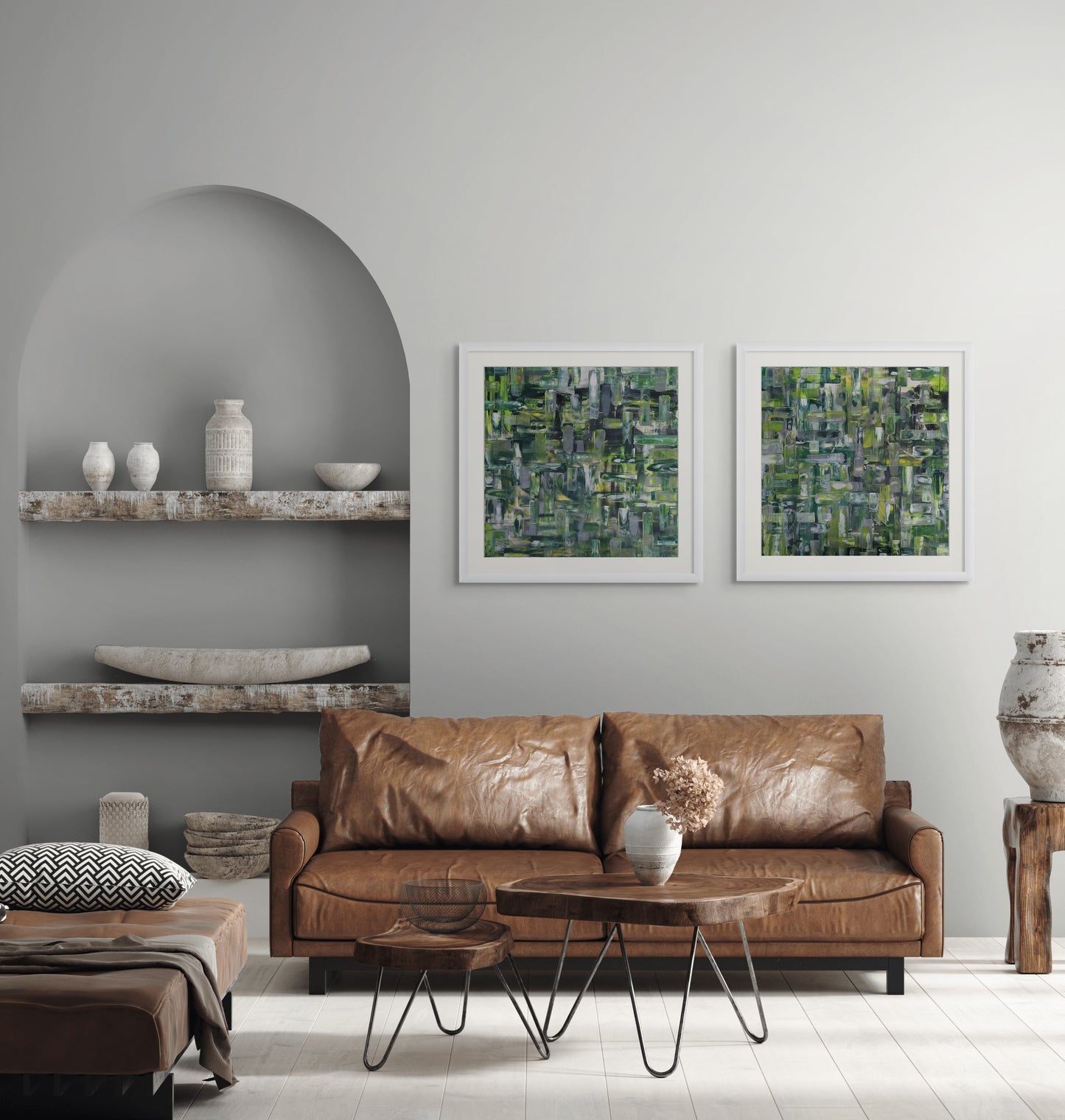 Modern living room with a brown leather sofa, coffee table, and abstract art on the wall.