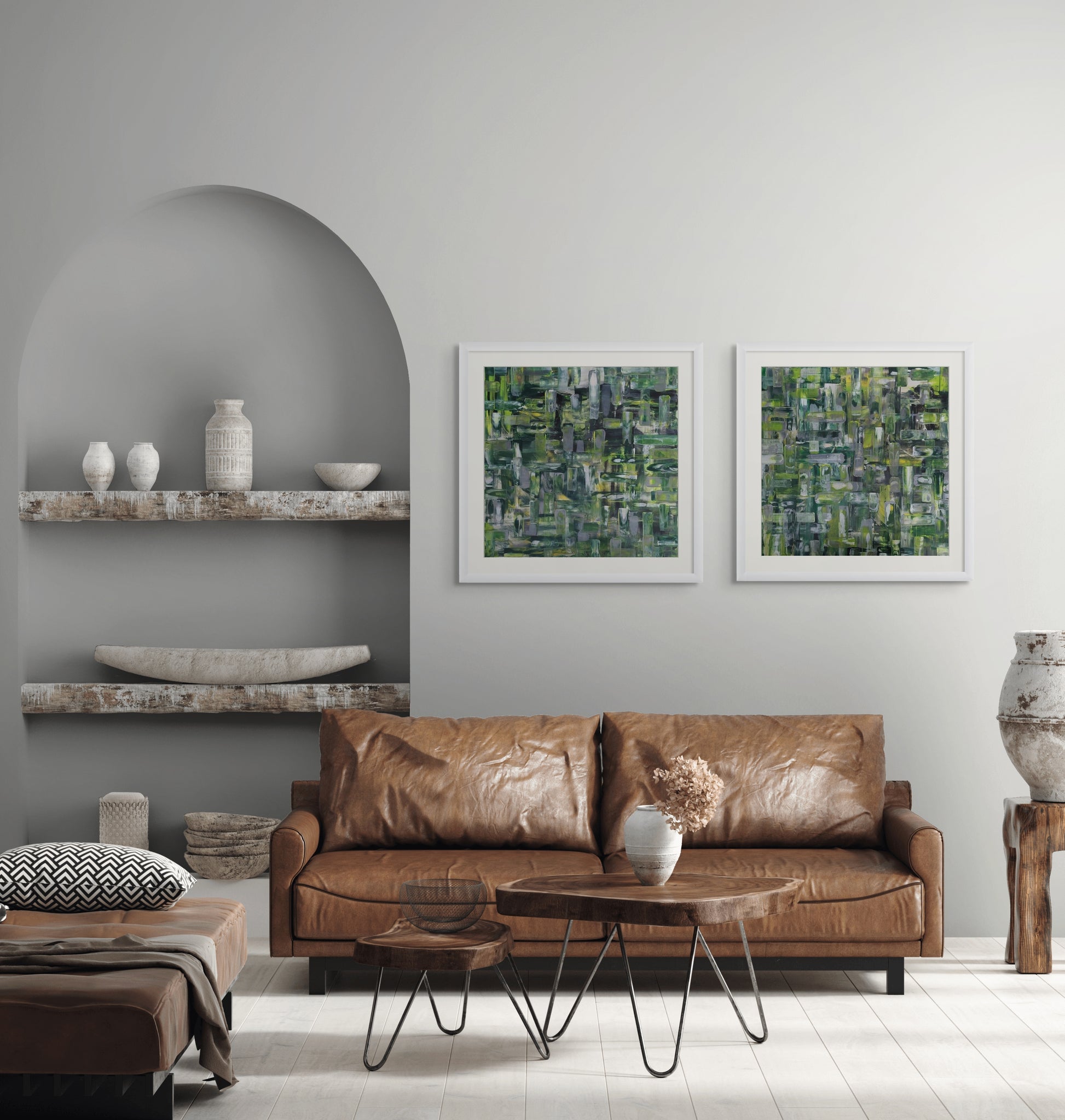Modern living room with a brown leather sofa, coffee table, and abstract art on the wall.