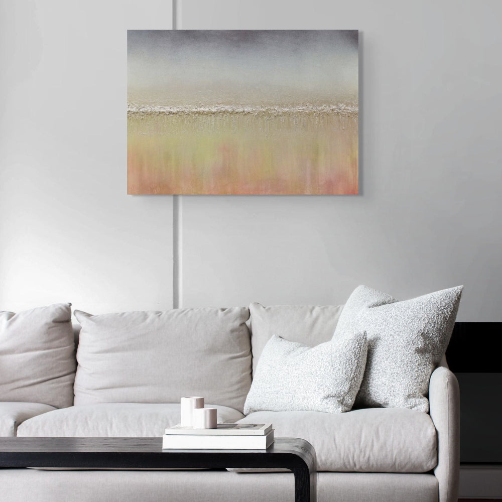 Living room with a white sofa, coffee table, and abstract painting on the wall. Otoño textured abstract original painting by Julie Bevan