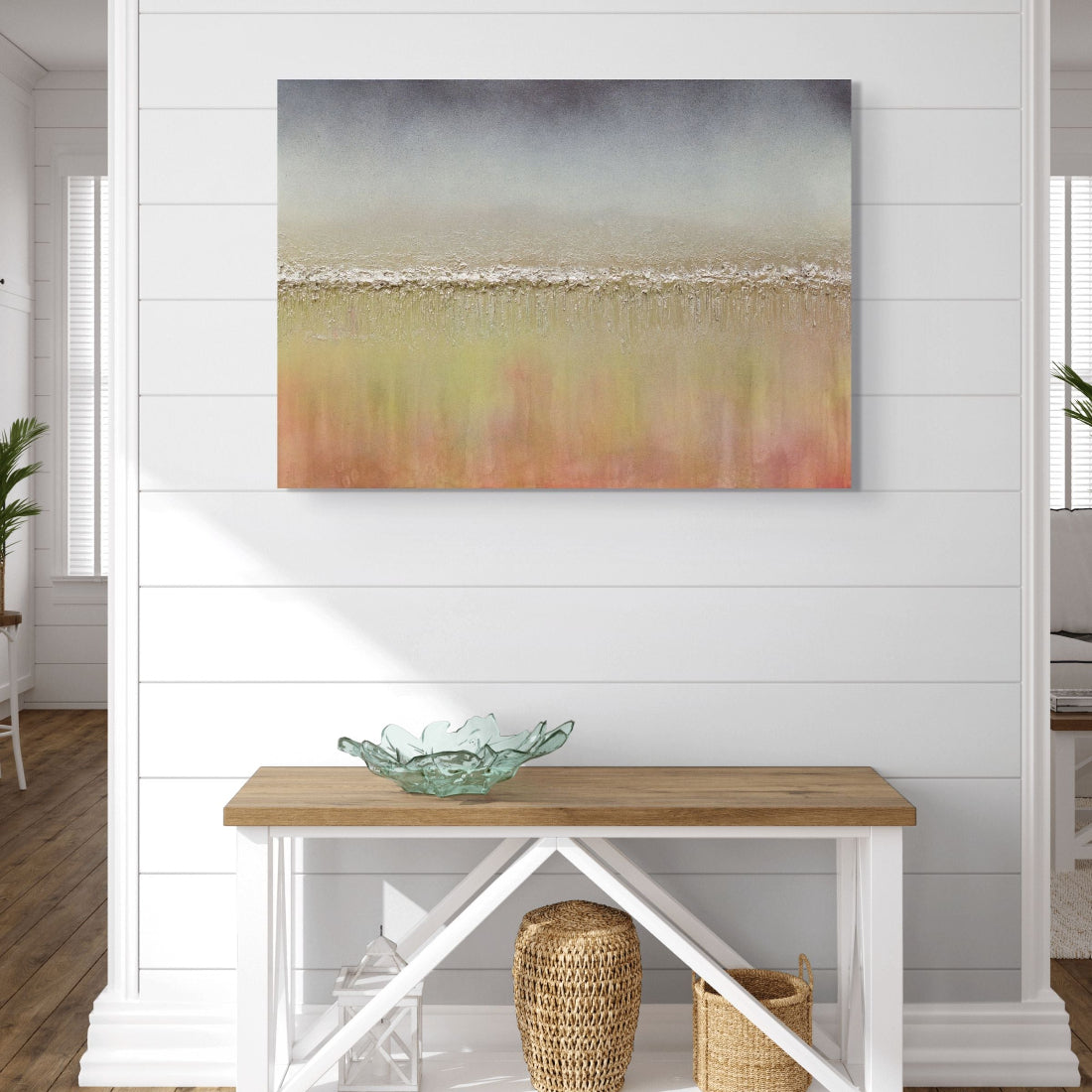 Decorative interior with a colorful abstract painting on a white wall, wooden bench, and decorative items.Otoño textured abstract original painting by Julie Bevan