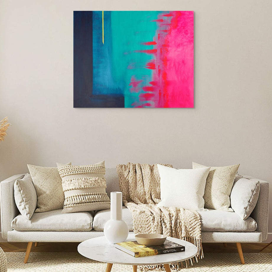 Modern living room with a colorful abstract painting on the wall, a white sofa with pillows, and a coffee table. Abstract Original painting titled Outside the Box by Julie Bevan