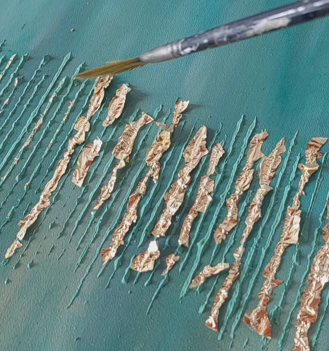 Video of application of gold leaf onto original painting Golden Forest