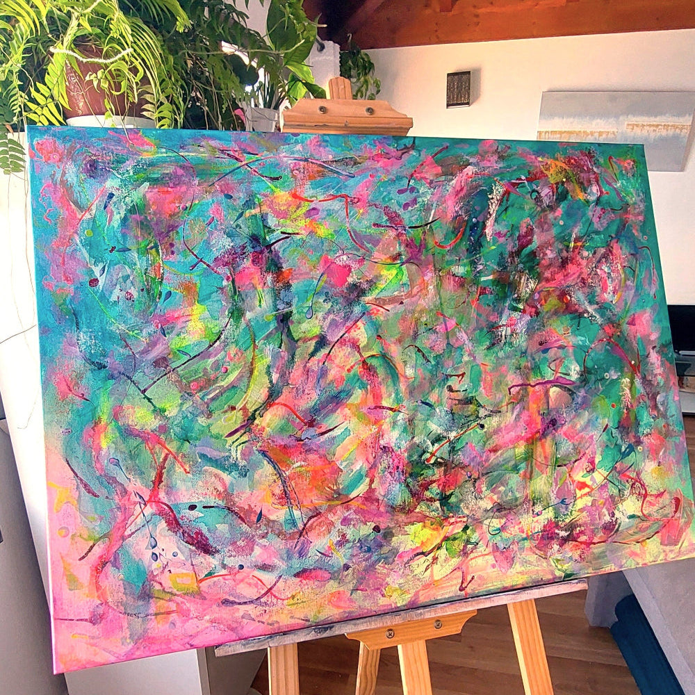 Abstract artwork with vibrant colours and dynamic brush strokes, original canvas art by Julie Bevan on easel