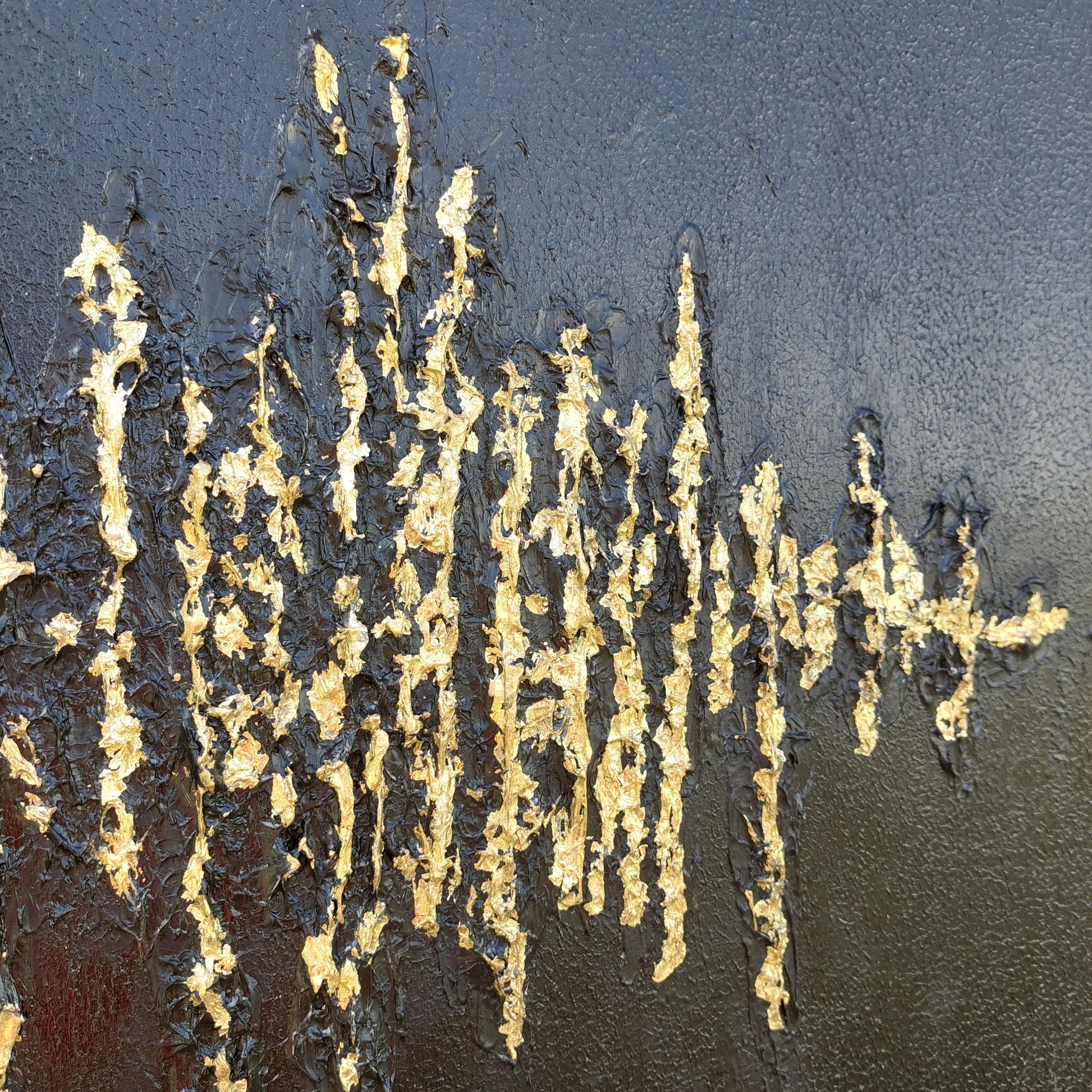 Detail of Black textured painting with gold leaf overlay