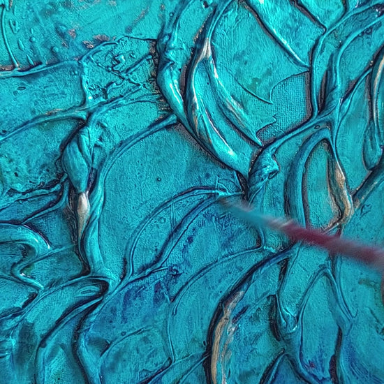 video of Heavily textured aqua blue painting on canvas