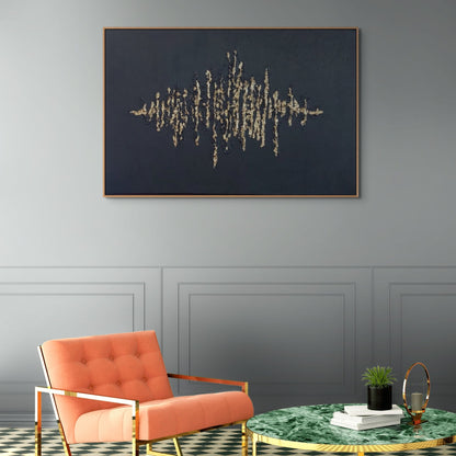 Black textured painting with gold leaf overlay hanging over peach and gold chair
